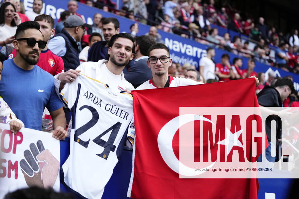 CA Osasuna v Real Madrid CF - LaLiga EA Sports PAMPLONA, SPAIN - MARCH 16: Arda Guler fans hold Turkish flag and Arda Guler s jersey to show their support prior the LaLiga EA Sports match between CA Osasuna and Real Madrid CF at Estadio El Sadar on March 16, 2024 in Pamplona, Spain. Spain World. Editorial use only. Please get in touch for any other usage.