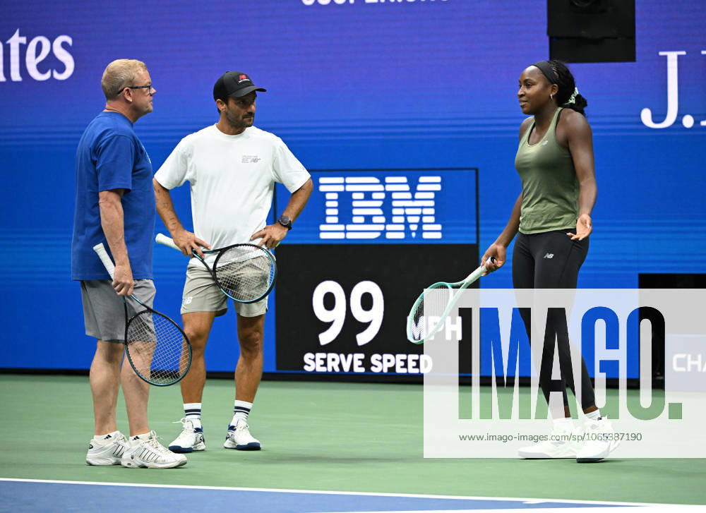 FLUSHING NY- AUGUST 21: Coco Gauff is seen on the practice court with her coach Jean-Christophe Faurel and Gavin MacMillan on Arthur Ashe Stadium at the USTA Billie Jean King National Tennis Center on August 21, 2025 in Flushing Queens.