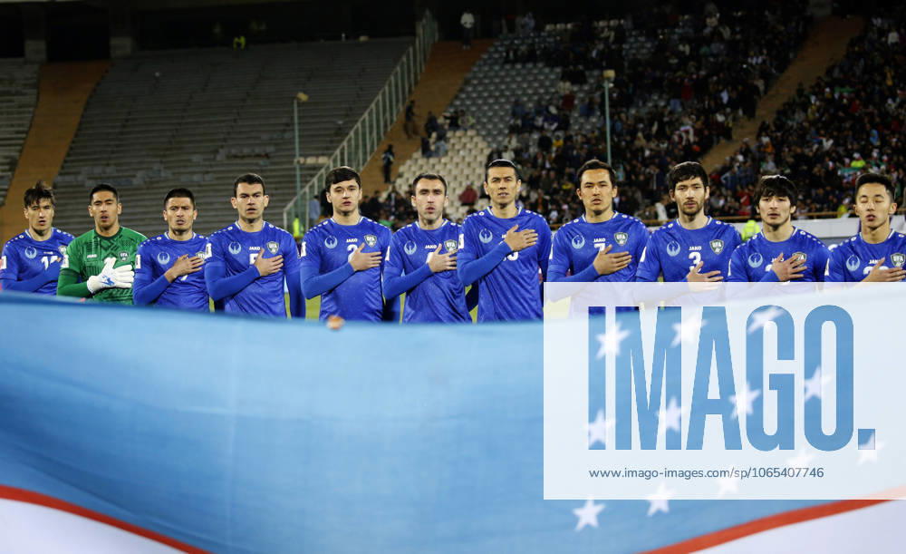 Iran v Uzbekistan - 2026 FIFA World Cup, WM, Weltmeisterschaft, Fussball Asian Qualifiers TEHRAN, IRAN - MARCH 25: Players of Uzbekistan line up for the national anthem ahead of the 2026 FIFA World Cup Asian Qualifiers Group A game between Iran and Uzbekistan at Azadi Stadium on March 25, 2025 in Tehran, Iran. Tahran Iran. Editorial use only. Please get in touch for any other usage.