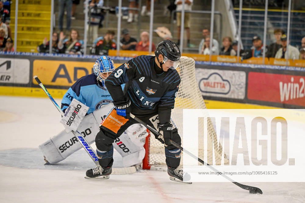Eishalle Linz, AUT, ice hockey preparation test match, Black Wings Linz AUT vs HK Nitra SVK , in the picture Jasper Patrikainen HK Nitra vs Emilio Romig Black Wings Linz Linz Oberoesterreich Austria