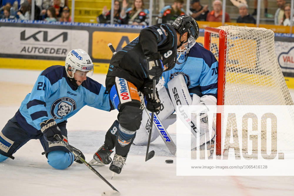 Eishalle Linz, AUT, ice hockey preparation test match, Black Wings Linz AUT vs HK Nitra SVK , in the picture Adam Nemec HK Nitra vs Emilio Romig Black Wings Linz , Jasper Patrikainen HK Nitra Linz Oberoesterreich Austria
