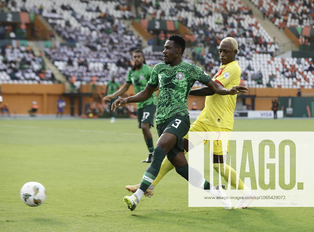 Nigeria v Angola - Africa Cup of Nations ABIDJAN, IVORY COAST - FEBRUARY 02: Zaidu Sanusi (L) of Nigeria in action against Gilberto (R) of Angola during the Africa Cup of Nations quarterfinal match between Nigeria and Angola at Felix Houphouet Boigny Stadium in Abidjan, Ivory Coast on February 02, 2024. Côte d Ivoire World. Editorial use only. Please get in touch for any other usage.