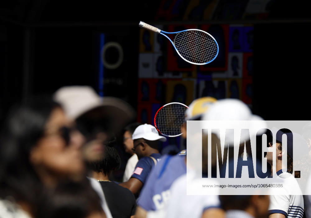 An entertainer juggler throws tennis racket in the air outside by Arthur Ashe Stadium on Arthur Ashe Kids Day at the 2025 US Open Tennis Championship at the USTA Billie Jean King National Tennis Center in New York City on Saturday, August 23, 2025 in New York City. NYP20250823111 JOHNxANGELILLO
