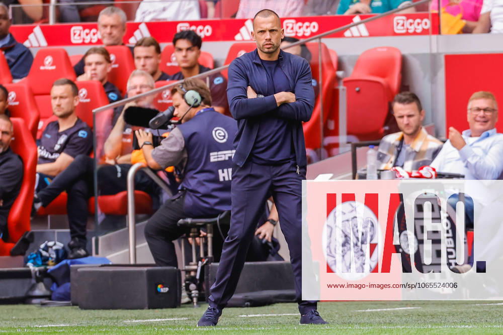 Eredivisie: AFC Ajax Amsterdam v Heracles Almelo Amsterdam - Coach John Heitinga of AFC Ajax Amsterdam looks on prior during the third round of the 2025 2026 Eredivisie season. The match is set between AFC Ajax Amsterdam and Heracles Almelo at Johan Cruijff ArenA on 24 August 2025 in Amsterdam, The Netherlands. (VK Sportphoto Raymond Smit)