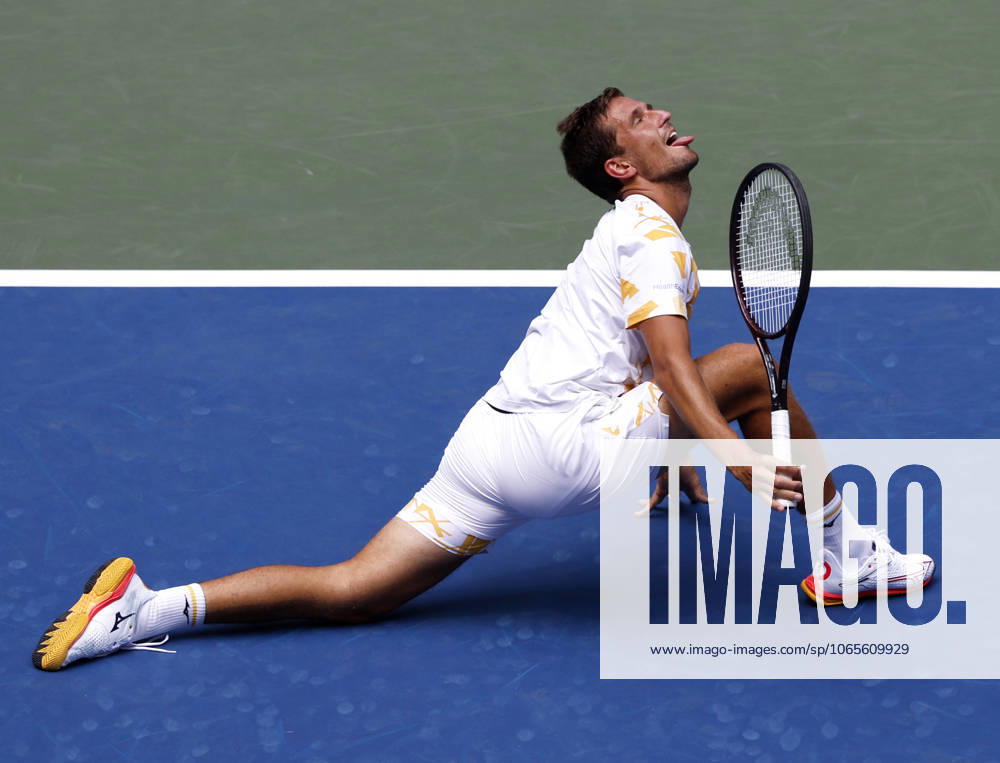 Vit Kopriva of Czechia reacts after stretching out to return a ball to Jannik Sinner of Italy in the first set of their first round match in Arthur Ashe Stadium on day 3 at the 2025 US Open Tennis Championship at the USTA Billie Jean King National Tennis Center in New York City on Tuesday, August 26, 2025. NYP20250826128 JOHNxANGELILLO