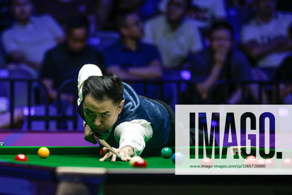 Xiao Guodong of China plays a shot in the Semifinal match against Mark J Williams of Wales on day 6 of the 2025 Wuhan Open at Optics Valley Gymnasium of HUST on August 29, 2025 in Wuhan, Hubei Province of China.