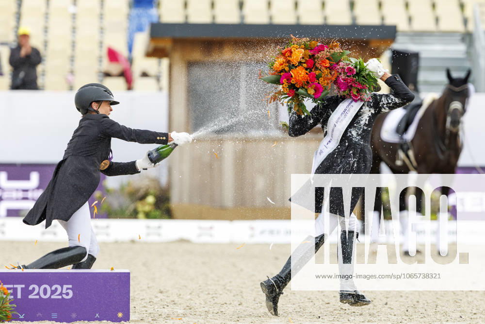 CROZET FRA FEI Dressage European Championship 2025, CROZET FRA FEI Dressage European Championship 2025 VERBOOMEN Justin BEL , LAUDRUP DUFOUR Cathrine DEN , WERTH Isabell GER Champagne shower Prize giving ceremony Grand Prix Special Individual Competition Crozet, Jiva Hill Stables August 29, 2025