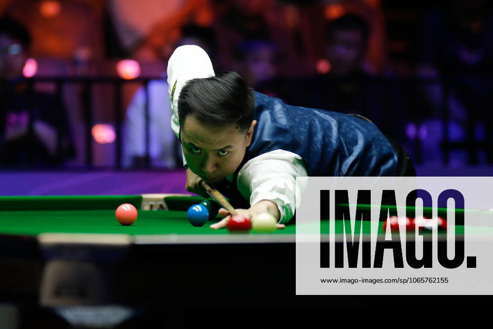 Xiao Guodong of China plays a shot in the Final match against Gary Wilson of England on day 7 of the 2025 Wuhan Open at Optics Valley Gymnasium of HUST on August 30, 2025 in Wuhan, Hubei Province of China.