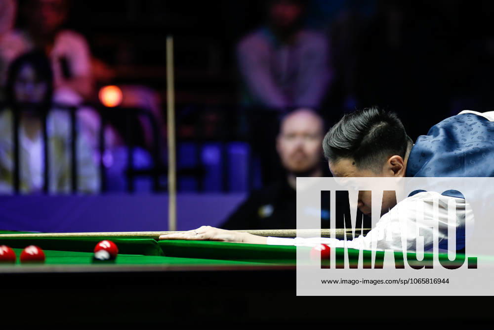 Xiao Guodong of China plays a shot in the Final match against Gary Wilson of England on day 7 of the 2025 Wuhan Open at Optics Valley Gymnasium of HUST on August 30, 2025 in Wuhan, Hubei Province of China.