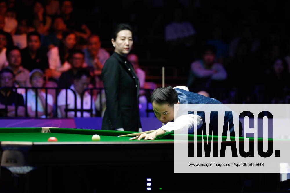 Xiao Guodong of China plays a shot in the Final match against Gary Wilson of England on day 7 of the 2025 Wuhan Open at Optics Valley Gymnasium of HUST on August 30, 2025 in Wuhan, Hubei Province of China.