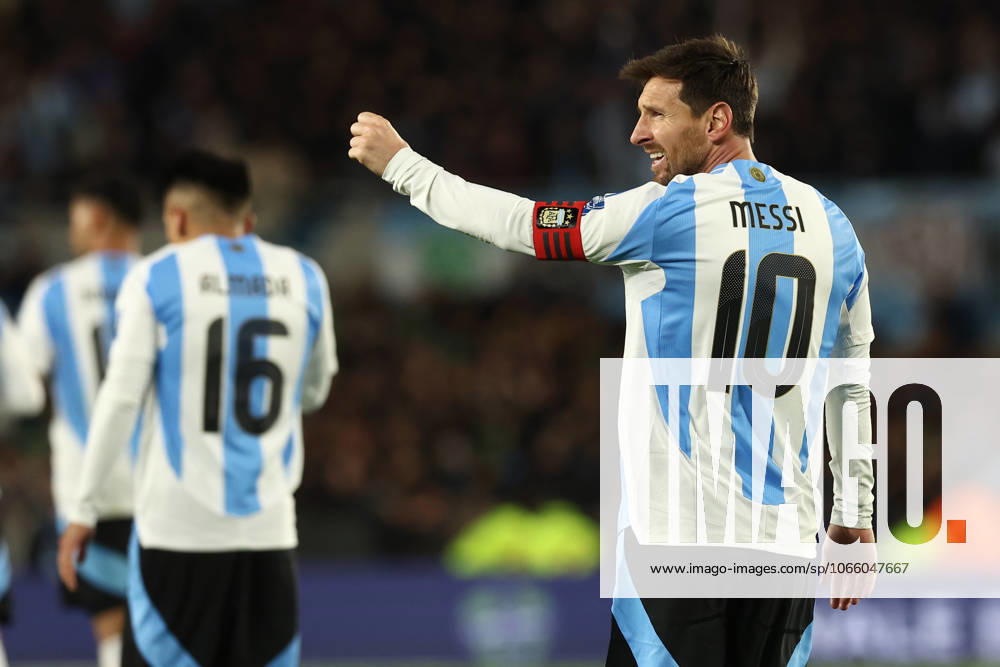 Argentina s forward Lionel Messi R celebrates after scoring the teams third goal during the South American qualification football match between Argentina and Venezuela for the FIFA World Cup 2026 at the Monumental stadium in Buenos Aires on September 4, 2025 BUENOS AIRES ARGENTINA