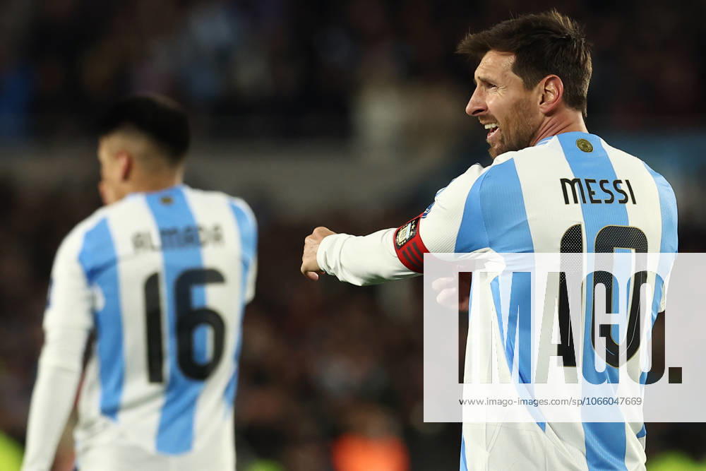 Argentina s forward Lionel Messi R celebrates after scoring the teams third goal during the South American qualification football match between Argentina and Venezuela for the FIFA World Cup 2026 at the Monumental stadium in Buenos Aires on September 4, 2025 BUENOS AIRES ARGENTINA