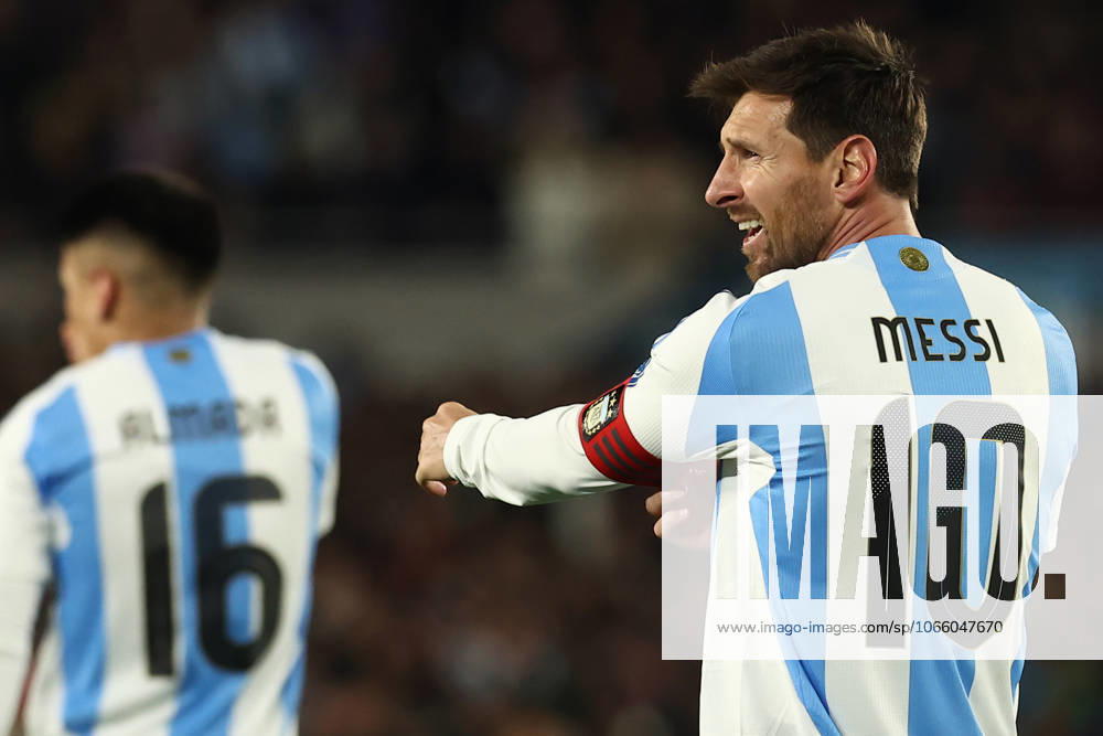 Argentina s forward Lionel Messi R celebrates after scoring the teams third goal during the South American qualification football match between Argentina and Venezuela for the FIFA World Cup 2026 at the Monumental stadium in Buenos Aires on September 4, 2025 BUENOS AIRES ARGENTINA