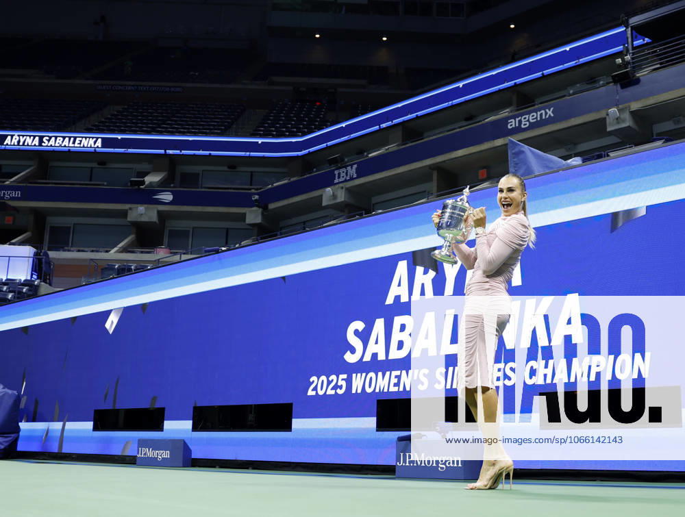 Aryna Sabalenka of Belarus gets spruced up,and brings her US Open Championship Trophy into Arthur Ashe Stadium for photos after defeating Amanda Anisimova at the Women s Finals of the 2025 US Open Tennis Championship in Arthur Ashe Stadium at the USTA Billie Jean King National Tennis Center in Flushing Meadows, New York on Saturday, September 6, 2025. Sabalenka defeated Anisimova 6-3, 7-6 to win her second consecutive US Open Championship. NYP202509062205 JOHNxANGELILLO