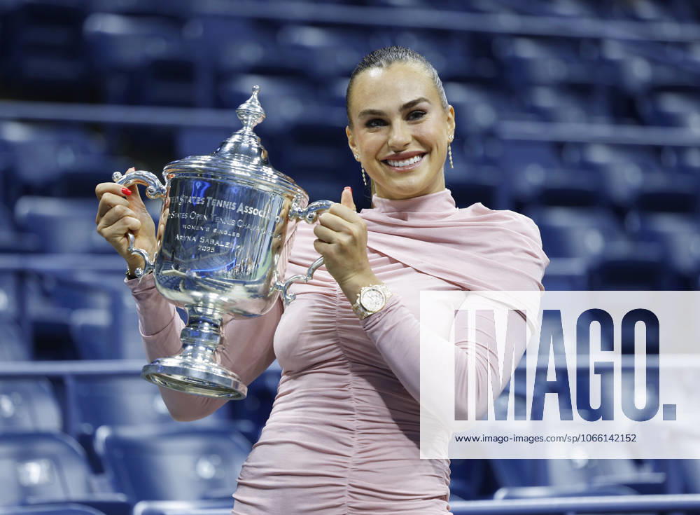 Aryna Sabalenka of Belarus gets spruced up,and brings her US Open Championship Trophy into Arthur Ashe Stadium for photos after defeating Amanda Anisimova at the Women s Finals of the 2025 US Open Tennis Championship in Arthur Ashe Stadium at the USTA Billie Jean King National Tennis Center in Flushing Meadows, New York on Saturday, September 6, 2025. Sabalenka defeated Anisimova 6-3, 7-6 to win her second consecutive US Open Championship. NYP20250906224 JOHNxANGELILLO