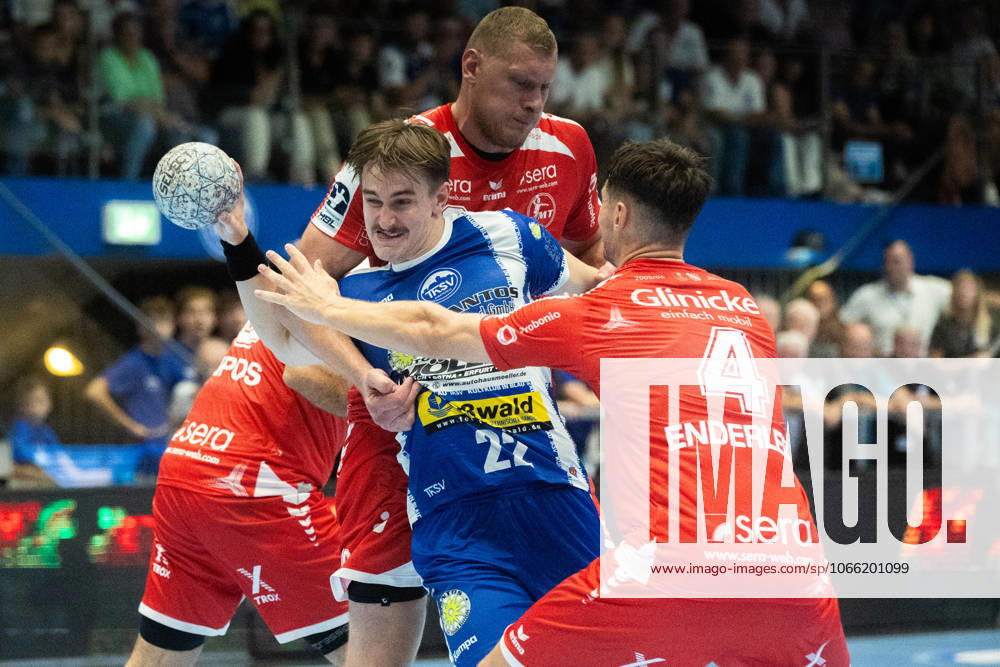 , 1 Handball Bundesliga THSV Eisenach vs MT Melsungen In the picture Nikolaj Enderleit and Dainis Kristopans Melsungen vs Felix Aelen Eisenach