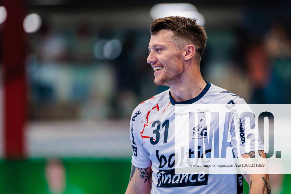 Emil Jakobsen SG Flensburg Handewitt, 31 smiles happy GER, GWD Minden vs SG Flensburg Handewitt, Handball, 1 Bundesliga, Matchday 3, Season 2025 2026, 08 09 2025 GER, GWD Minden vs SG Flensburg Handewitt, Handball, 1 Bundesliga, Matchday 3, Season 2025 2026, 08 09 2025 Luebbecke