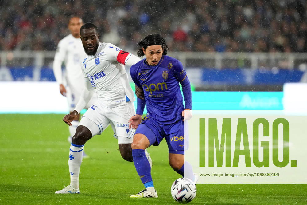 AJ Auxerre v AS Monaco - Ligue 1 McDonald s 2025 2026 42 Elisha OWUSU (aja) - 18 Takumi MINAMINO (asm) during the Ligue 1 McDonald s match between Auxerre and Monaco at Stade Abbe Deschamps on September 13, 2025 in Auxerre, France. Auxerre France