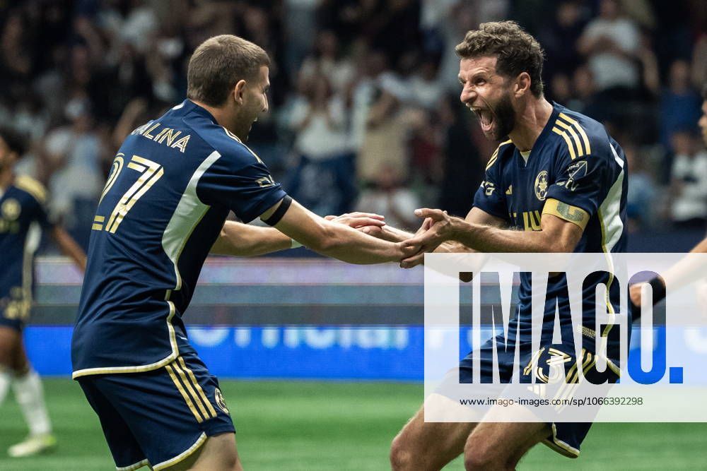 Vancouver Whitecaps Thomas Muller (13) celebrates his goal against the Philadelphia Union, with Vancouver Whitecaps Giuseppe Bovalina (27) during the second half of an MLS, Fussball Herren, USA soccer match in Vancouver, on Saturday, Sept. 13, 2025. Canada News - September 13, 2025 - ZUMAc35_ 20250913_zaf_c35_302