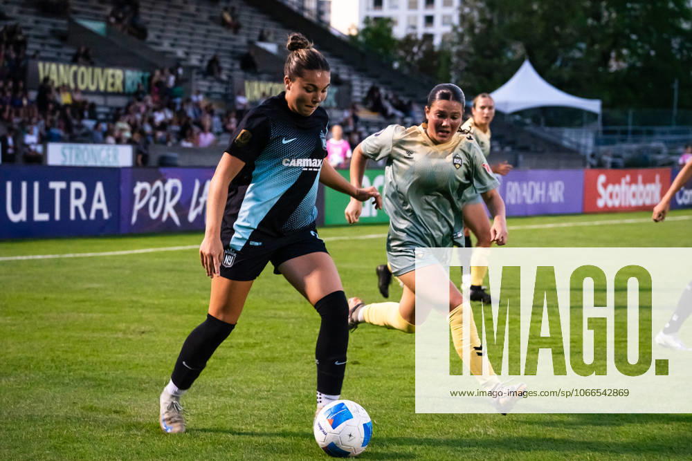Khyah Harper (34 Gotham FC) controls the ball while Adri Giese (47 Vancouver Rise FC Academy) follows closely during the Concacaf W Champions Cup group stage soccer match between Vancouver Rise FC Academy and Gotham FC at Swangard Stadium in Burnaby, British Columbia, Canada (EDITORIAL USAGE ONLY).