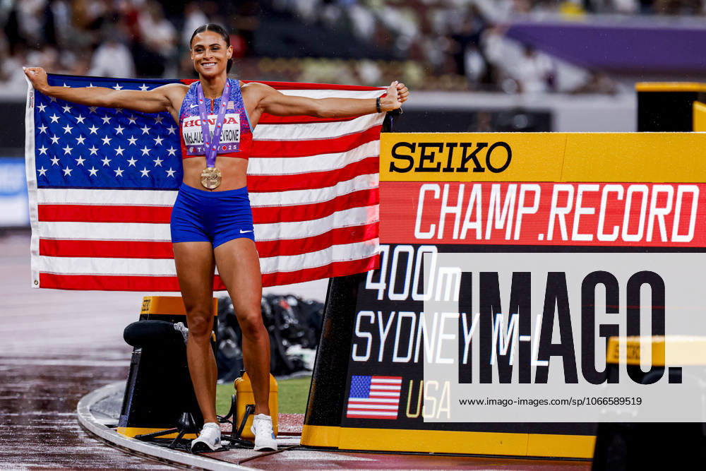 Winner Sydney Mclaughlin Levrone of United States of America with a championship record and celebrating and holding flag after competing in the Women s 400 Metres Final during World Athletics Championships Tokyo 2025 of the Day 6 at Japan National Stadium on September 18, 2025 in Tokyo, Japan Photo by Marcel ter Bals DeFodi Images