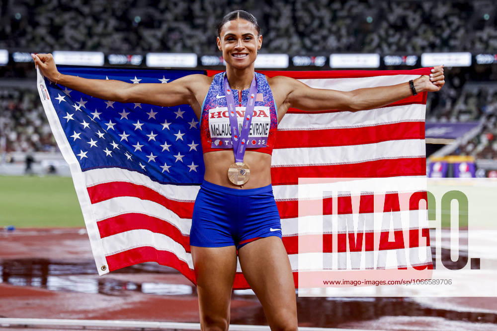 Winner Sydney Mclaughlin Levrone of United States of America showing her gold medal and celebrating and holding flag after competing in the Women s 400 Metres Final during World Athletics Championships Tokyo 2025 of the Day 6 at Japan National Stadium on September 18, 2025 in Tokyo, Japan Photo by Marcel ter Bals DeFodi Images