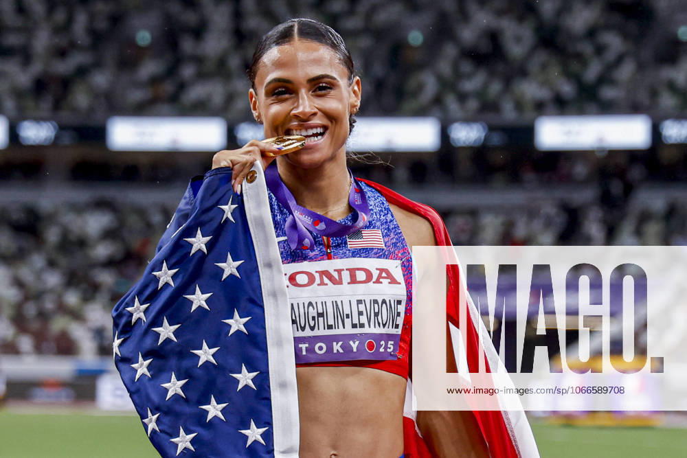 Winner Sydney Mclaughlin Levrone of United States of America showing her gold medal and celebrating and holding flag after competing in the Women s 400 Metres Final during World Athletics Championships Tokyo 2025 of the Day 6 at Japan National Stadium on September 18, 2025 in Tokyo, Japan Photo by Marcel ter Bals DeFodi Images