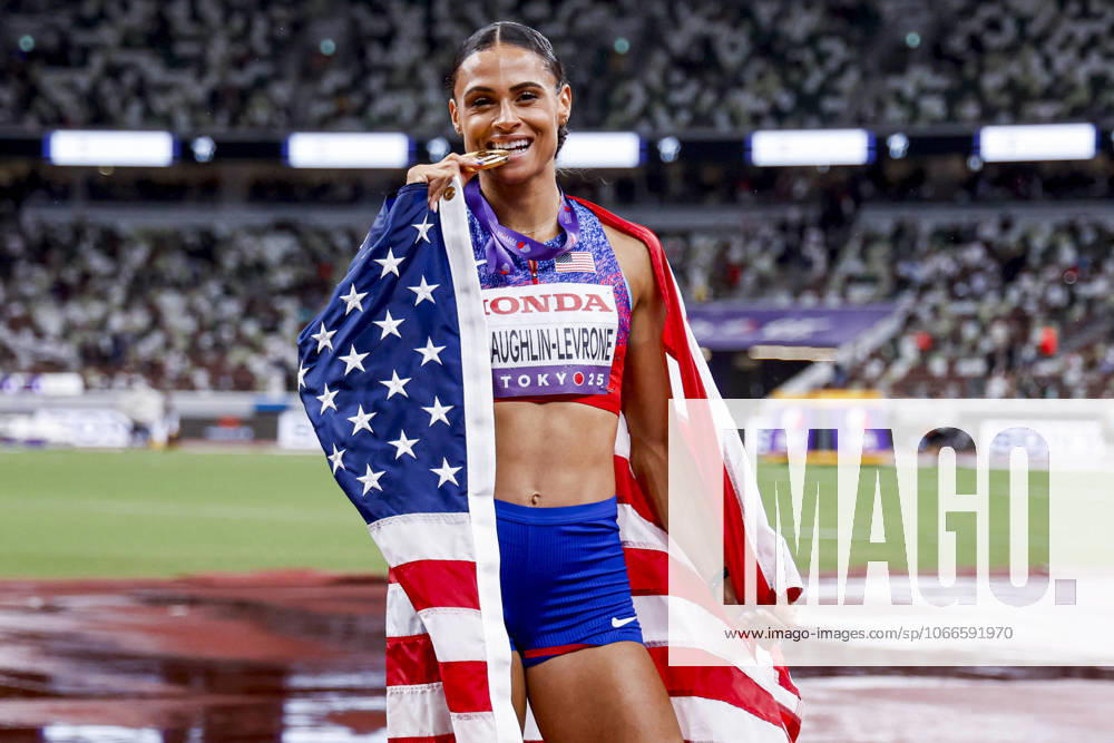 Winner Sydney Mclaughlin Levrone of United States of America showing her gold medal and celebrating and holding flag after competing in the Women s 400 Metres Final during World Athletics Championships Tokyo 2025 of the Day 6 at Japan National Stadium on September 18, 2025 in Tokyo, Japan Photo by Marcel ter Bals DeFodi Images