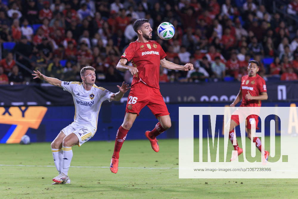 Paulinho 26 of Toluca FC receives the ball as John Nelson 14 of the LA Galaxy defends during their 2025 Michelob ULTRA Campeones Cup match on Wednesday October 1, 2025 at the Dignity Health Sports Park in Carson, California. Toluca defeats Galaxy, 3-2. ARIANA RUIZ PI Carson USA - ZUMAp124 20251001_zaa_p124_053