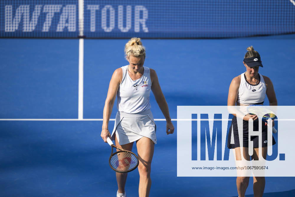 (251010) -- WUHAN, Oct. 10, 2025 -- Storm Hunter (R) Katerina Siniakova react during the women s doubles quarterfinal between Chan Hao-Ching (Chinese Taipei) Jiang Xinyu (China) and Storm Hunter (Australia) Katerina Siniakova (the Czech Republic) at the 2025 Wuhan Open tennis tournament in Wuhan, central China s Hubei Province, Oct. 10, 2025. ) (SP)CHINA-WUHAN-TENNIS-WUHAN OPEN-WOMEN S DOUBLES-QUARTERFINAL (CN) WuxZhizun
