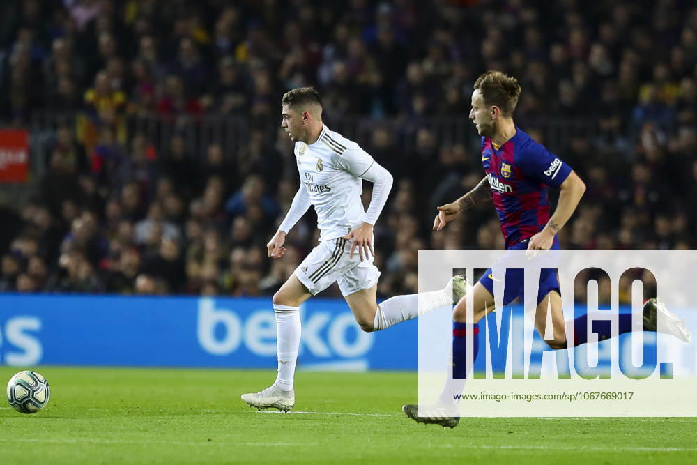 FC Barcelona, Barca v Real Madrid: La Liga BARCELONA, SPAIN - DEC 18: Real Madrid s Uruguayan defender Federico Valverde (L) vies with Barcelona s Croatian midfielder Ivan Rakitic (R) during Spanish El Clasico football match between FC Barcelona and Real Madrid at the Camp Nou stadium in Barcelona on December 18, 2019. Spain World. Editorial use only. Please get in touch for any other usage.