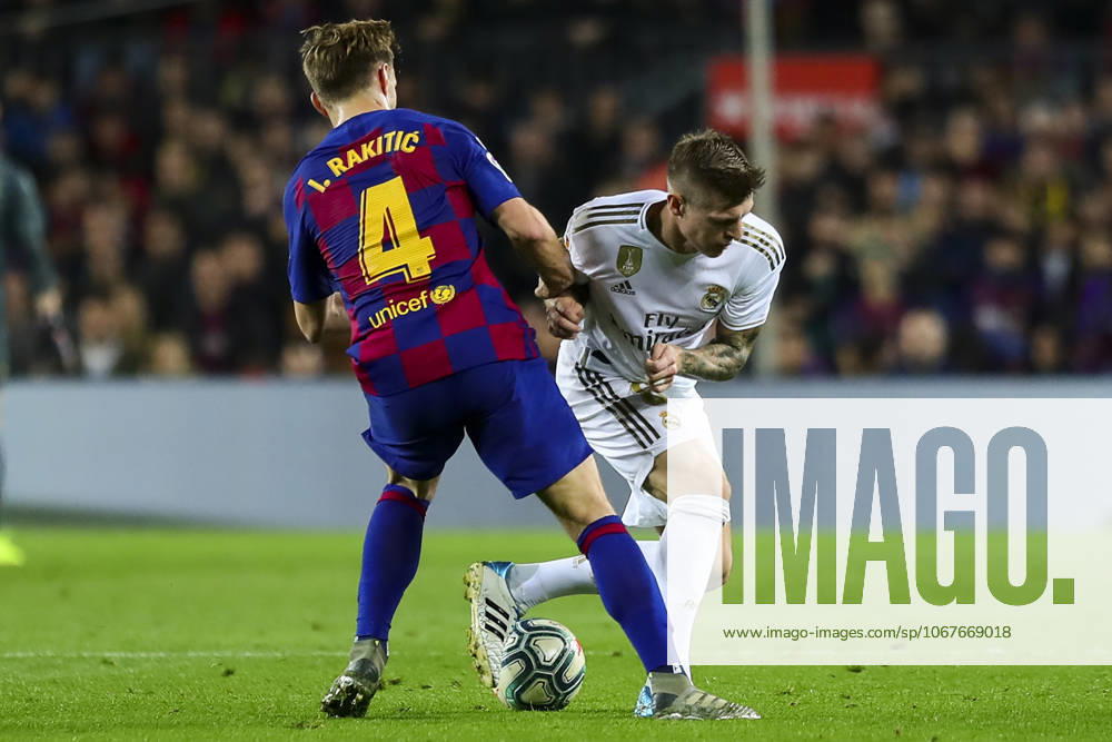 FC Barcelona, Barca v Real Madrid: La Liga BARCELONA, SPAIN - DEC 18: Barcelona s Croatian midfielder Ivan Rakitic (L) vies with Real Madrid s Uruguayan defender Federico Valverde (R) during Spanish El Clasico football match between FC Barcelona and Real Madrid at the Camp Nou stadium in Barcelona on December 18, 2019. Spain World. Editorial use only. Please get in touch for any other usage.
