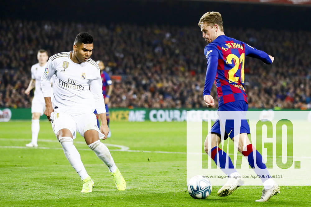 FC Barcelona, Barca v Real Madrid: La Liga BARCELONA, SPAIN - DECEMBER 18: Real Madrid s Brazilian midfielder Carlos Casemiro (L) vies with Barcelona s Dutch midfielder Frekie De Jong (R) during Spanish El Clasico football match between FC Barcelona and Real Madrid at the Camp Nou stadium in Barcelona on December 18, 2019. Catalonia Spain. Editorial use only. Please get in touch for any other usage.