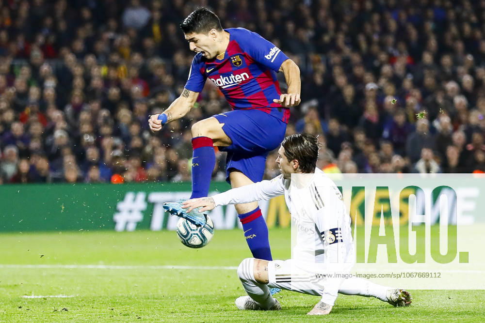 FC Barcelona, Barca v Real Madrid: La Liga BARCELONA, SPAIN - DECEMBER 18: Barcelona s Uruguayan forward Luis Suarez (L) vies with Real Madrid s Spanish defender Sergio Ramos (R) during Spanish El Clasico football match between FC Barcelona and Real Madrid at the Camp Nou stadium in Barcelona on December 18, 2019. Catalonia Spain. Editorial use only. Please get in touch for any other usage.