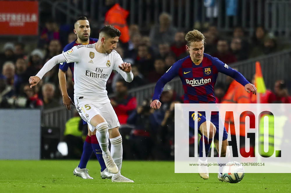 FC Barcelona, Barca v Real Madrid: La Liga BARCELONA, SPAIN - DECEMBER 18: Real Madrid s Brazilian Forward Vinicius Junior (Front L) vies with Barcelona s Dutch midfielder Frekie De Jong (R) during Spanish El Clasico football match between FC Barcelona and Real Madrid at the Camp Nou stadium in Barcelona on December 18, 2019. Catalonia Spain. Editorial use only. Please get in touch for any other usage.