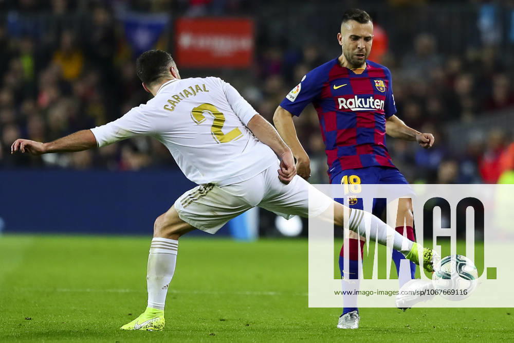 FC Barcelona, Barca v Real Madrid: La Liga BARCELONA, SPAIN - DECEMBER 18: Real Madrid s Spanish defender Daniel Carvajal (L) vies with Barcelona s Spanish defender Jordi Alba (R) during Spanish El Clasico football match between FC Barcelona and Real Madrid at the Camp Nou stadium in Barcelona on December 18, 2019. Catalonia Spain. Editorial use only. Please get in touch for any other usage.