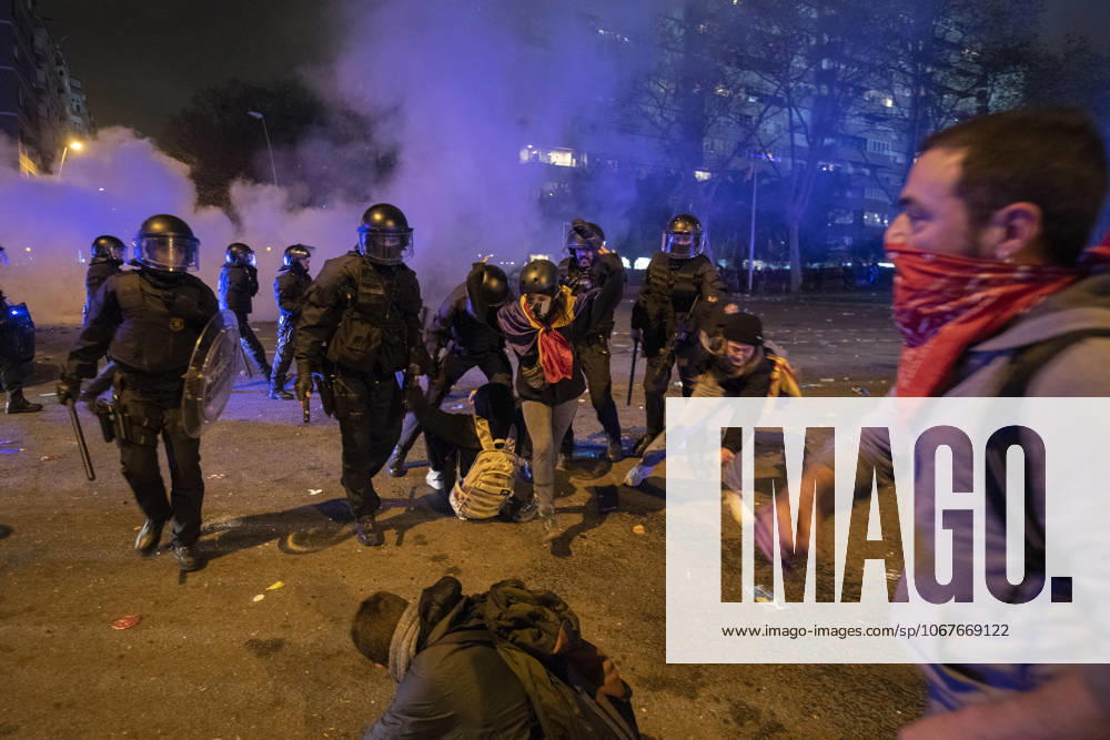 FC Barcelona, Barca v Real Madrid: La Liga BARCELONA, SPAIN - DECEMBER 18: Catalan regional police Mossos D Esquadra officers clash with demonstrators during a protest called by Catalan separatist movement Democratic Tsunami outside the Camp Nou stadium in Barcelona on December 18, 2019, during the El Clasico Spanish League football match between Barcelona FC and Real Madrid CF. Catalonia Spain. Editorial use only. Please get in touch for any other usage.