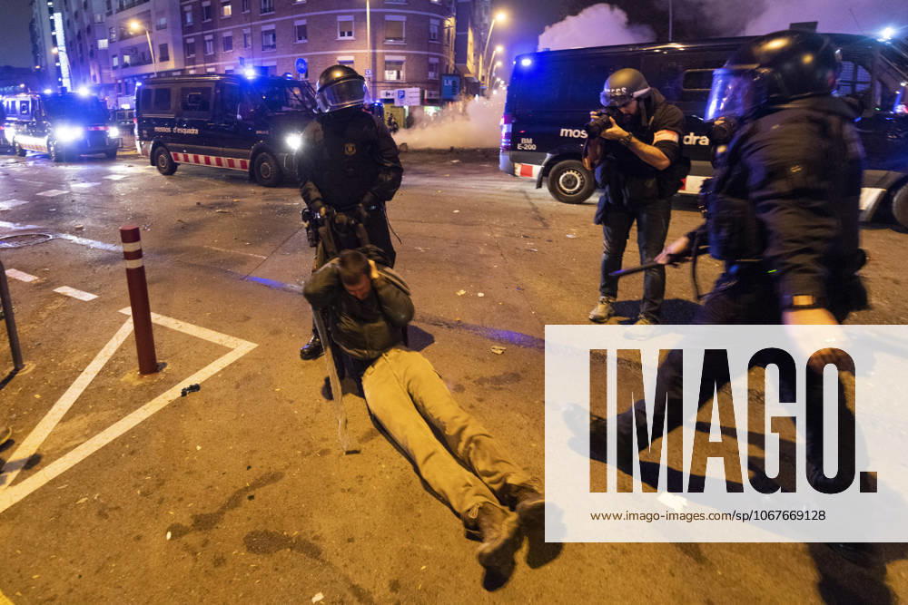 FC Barcelona, Barca v Real Madrid: La Liga BARCELONA, SPAIN - DECEMBER 18: Catalan regional police Mossos D Esquadra officers clash with demonstrators during a protest called by Catalan separatist movement Democratic Tsunami outside the Camp Nou stadium in Barcelona on December 18, 2019, during the El Clasico Spanish League football match between Barcelona FC and Real Madrid CF. Catalonia Spain. Editorial use only. Please get in touch for any other usage.