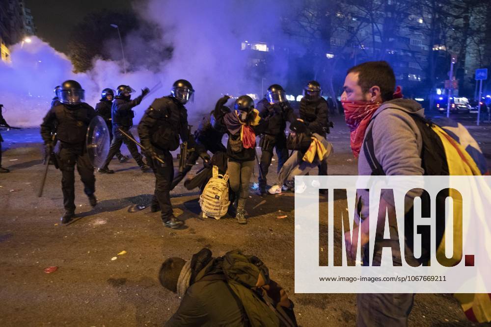 FC Barcelona, Barca v Real Madrid: La Liga BARCELONA, SPAIN - DECEMBER 18: Catalan regional police Mossos D Esquadra officers clash with demonstrators during a protest called by Catalan separatist movement Democratic Tsunami outside the Camp Nou stadium in Barcelona on December 18, 2019, during the El Clasico Spanish League football match between Barcelona FC and Real Madrid CF. Catalonia Spain. Editorial use only. Please get in touch for any other usage.
