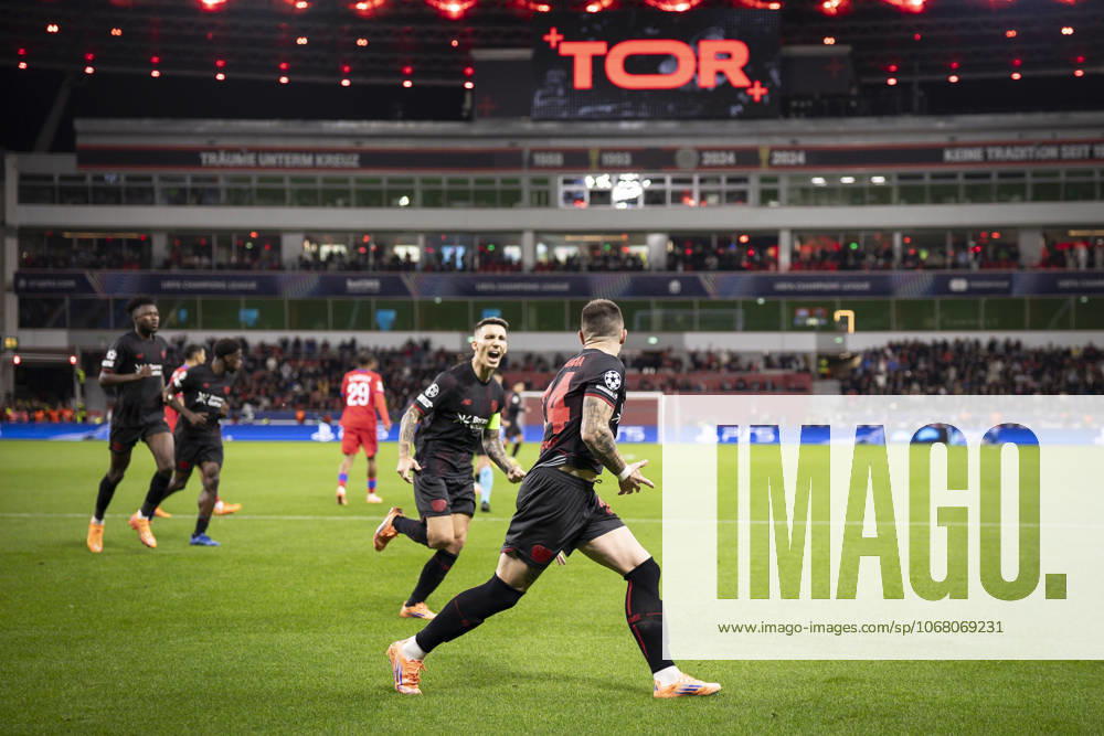 Aleix Garcia (Bayer 04 Leverkusen, 24) scored a penalty and is celebrating with Alejandro Grimaldo (Bayer 04 Leverkusen, 20) during the UEFA Champions League match on gameday 3 between Bayer 04 Leverkusen vs. Paris Saint-Germain at BayArena on October 21, 2025 in Leverkusen, Germany. DFL REGULATIONS PROHIBIT ANY USE OF PHOTOGRAPHS AS IMAGE SEQUENCES AND OR QUASI-VIDEO. Germany
