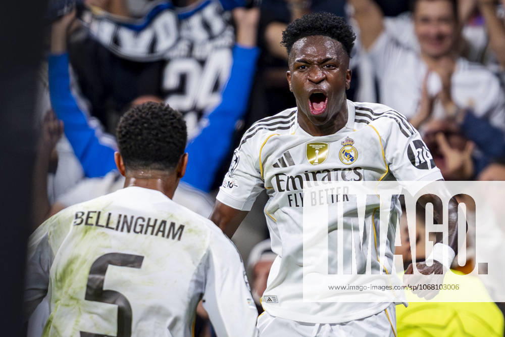 Real Madrid CF vs Juventus FC - UEFA Champions League 2025 26 League Phase MD3 Vinicius Junior of Real Madrid (R) celebrates a goal with Jude Bellingham of Real Madrid (L) during the UEFA Champions League 2025 26 League Phase MD3 match between Real Madrid C.F. and Juventus at Estadio Santiago Bernabeu on October 22, 2025 in Madrid, Spain. Madrid Estadio Santiago Bernabeu Madrid Spain