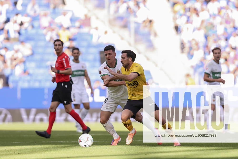 Edu Exposito of RCD Espanyol and Martim Neto of Elche CF in action during the Spanish league, La Liga EA Sports, football match played between RCD Espanyol and Elche CF at RCDE Stadium on October 25, 2025 in Cornella, Barcelona, Spain. Cornella SPAIN - ZUMAa181 20251025_zaa_a181_133
