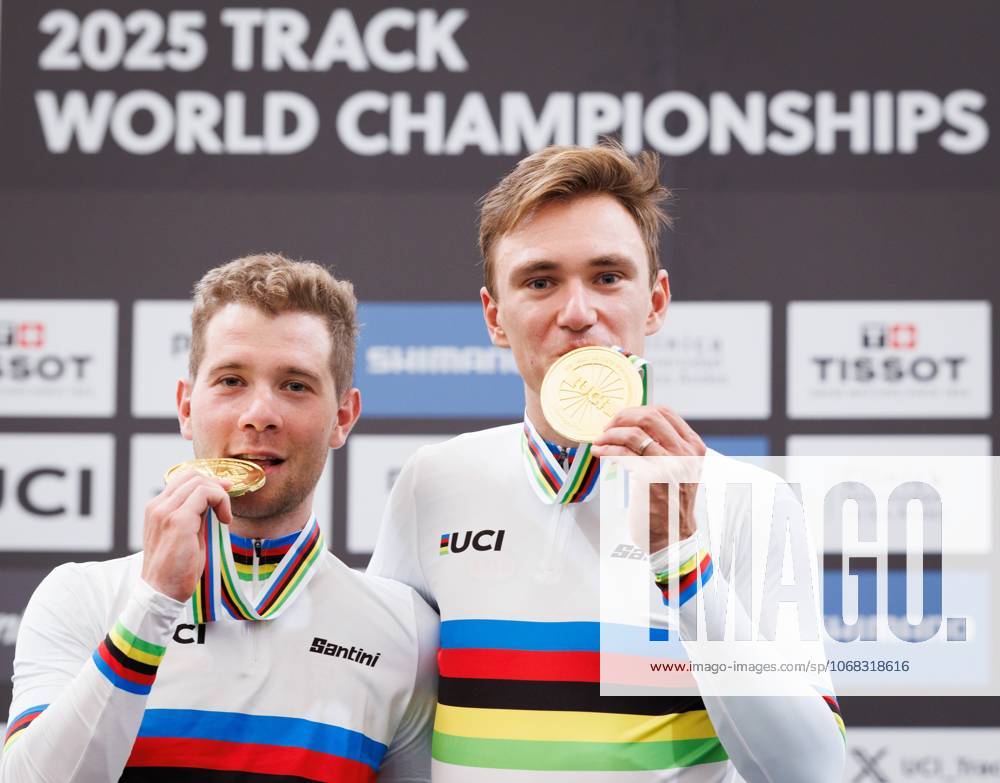 Belgian Fabio Van Den Bossche and Belgian Lindsay De Vylder celebrate celebrate on the podium with their gold medals and wearing the world champion jersey, on the podium of the podium ceremony of the men s Madison race at the 2025 UCI Track World Championships cycling, in Santiago, Chile, Sunday 26 October 2025. The Track World Championships take place from 22 to 26 October at the Velodromo de Penalolen in Santiago, Chile. BENOITxDOPPAGNE x138051491x