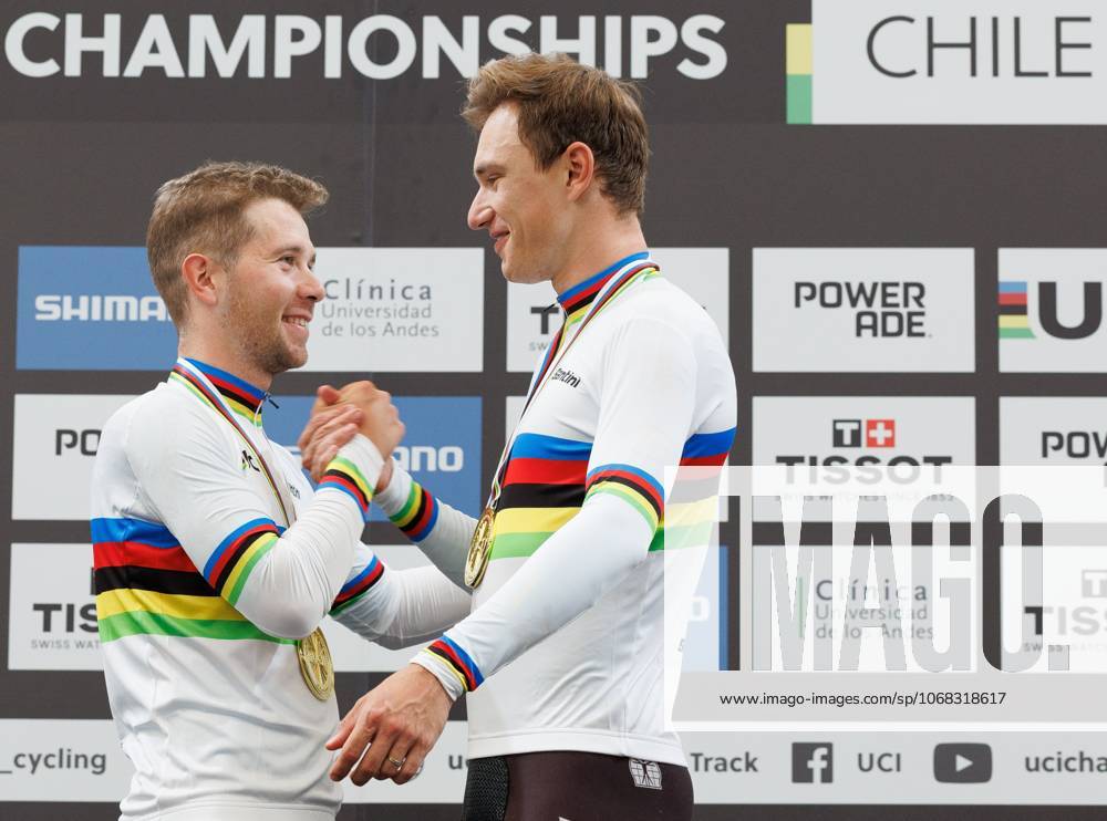 Belgian Fabio Van Den Bossche and Belgian Lindsay De Vylder celebrate on the podium after winning the podium ceremony of the men s Madison race at the 2025 UCI Track World Championships cycling, in Santiago, Chile, Sunday 26 October 2025. The Track World Championships take place from 22 to 26 October at the Velodromo de Penalolen in Santiago, Chile. BENOITxDOPPAGNE x138051499x