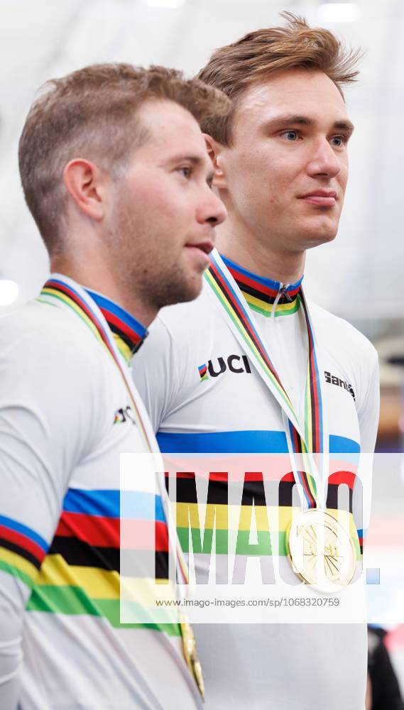Belgian Fabio Van Den Bossche and Belgian Lindsay De Vylder pictured after winning the podium ceremony of the men s Madison race at the 2025 UCI Track World Championships cycling, in Santiago, Chile, Sunday 26 October 2025. The Track World Championships take place from 22 to 26 October at the Velodromo de Penalolen in Santiago, Chile. BENOITxDOPPAGNE x138056373x