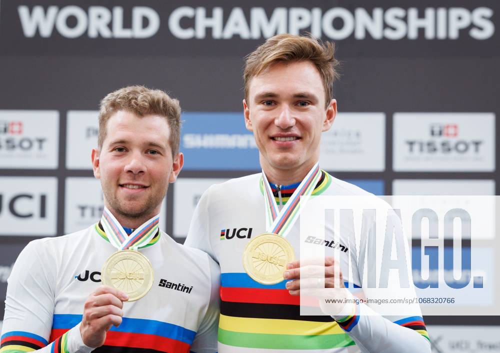 Belgian Fabio Van Den Bossche and Belgian Lindsay De Vylder celebrate on the podium after winning the podium ceremony of the men s Madison race at the 2025 UCI Track World Championships cycling, in Santiago, Chile, Sunday 26 October 2025. The Track World Championships take place from 22 to 26 October at the Velodromo de Penalolen in Santiago, Chile. BENOITxDOPPAGNE x138056445x