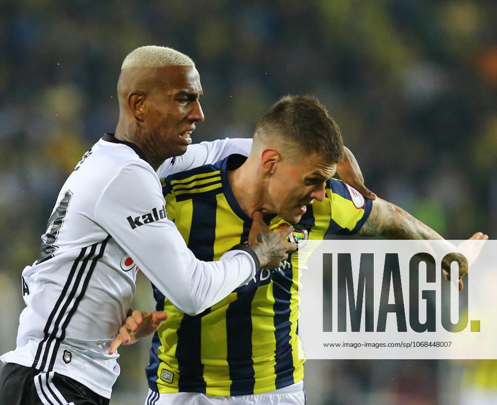 Fenerbahce v Besiktas: Ziraat Turkish Cup ISTANBUL, TURKEY - APRIL 19: Talisca (L) of Besiktas in action against Martin Skrtel (R) of Fenerbahce during Ziraat Turkish Cup Semi Final second leg soccer match between Fenerbahce and Besiktas at Ulker Stadium in Istanbul, Turkey on April 19, 2018. Istanbul Turkey. Editorial use only. Please get in touch for any other usage.