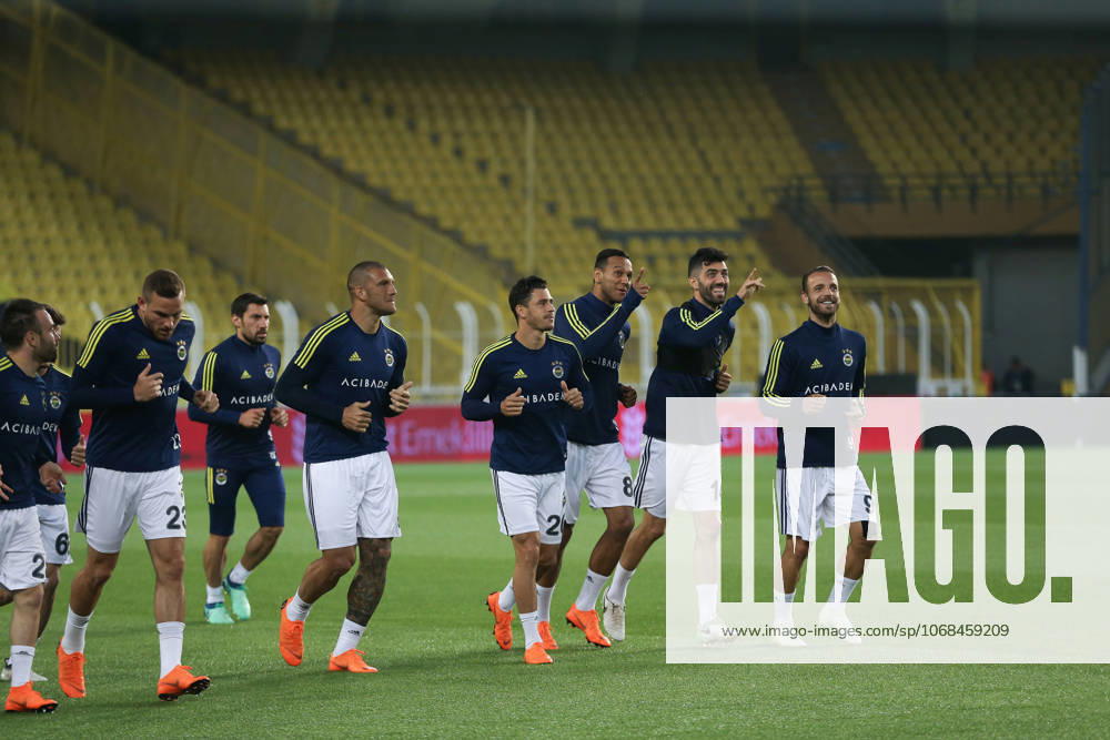 Fenerbahce v Besiktas: Ziraat Turkish Cup ISTANBUL, TURKEY - MAY 03: Players of Fenerbahce warm up ahead of the Ziraat Turkish Cup soccer match between Fenerbahce and Besiktas at Ulker Stadium in Istanbul, Turkey on May 03, 2018. The game was decided to continue without spectators due to the incidents took place in the semi final return match causing the game to be cancelled. Besiktas did not turn up for the replay with Fenerbahce as the club announced earlier. Istanbul Turkey. Editorial use only. Please get in touch for any other usage.