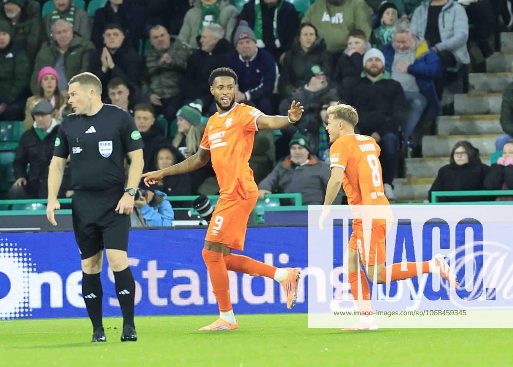 Hibernian v Rangers William Hill Premiership Youseff Chemiti of Rangers (middle) celebrates scoring his teams first goal with Connor Barron of Rangers during the William Hill Premiership match at Easter Road, Edinburgh UK Newspapers OUT