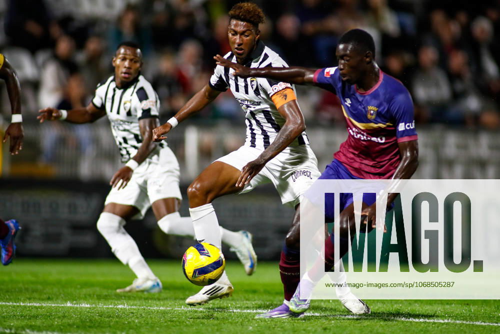 Liga Portugal 2: Portimonense - Torreense Portimao, Portugal - 30 10 2025: Liga Portugal 2 Meu Super 9th round match between SC Portimonense and SCU Torreense at Estadio Municipal de Portimao 9 Portimonense attacker, Tamble Ulisses Folgado Monteiro looks to get past 93 Torreense attacker, Mohamed Ali Diade Mandatory Credit: Toby Tande Avant Sports Agency Portimao Estadio Municipal de Portimao Portugal